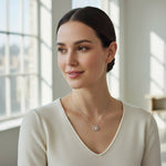 Model wearing 1ct dancing moissanite halo necklace