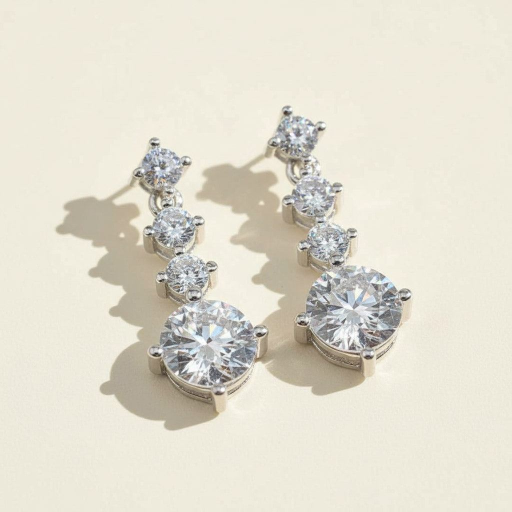 Sterling silver drop earrings with four round lab-grown diamonds, 2.0ct total weight, elegant bridal jewelry.