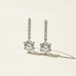 Platinum sterling silver drop earrings with 1ct round moissanite stone