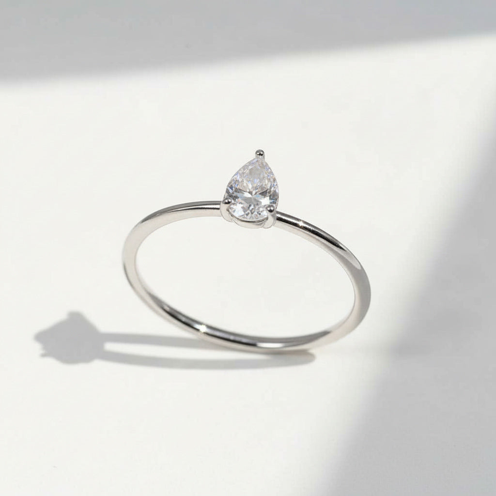 Platinum pear cut moissanite ring with 0.5ct center stone