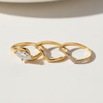 Three-piece gold-plated sterling silver marquise moissanite ring set