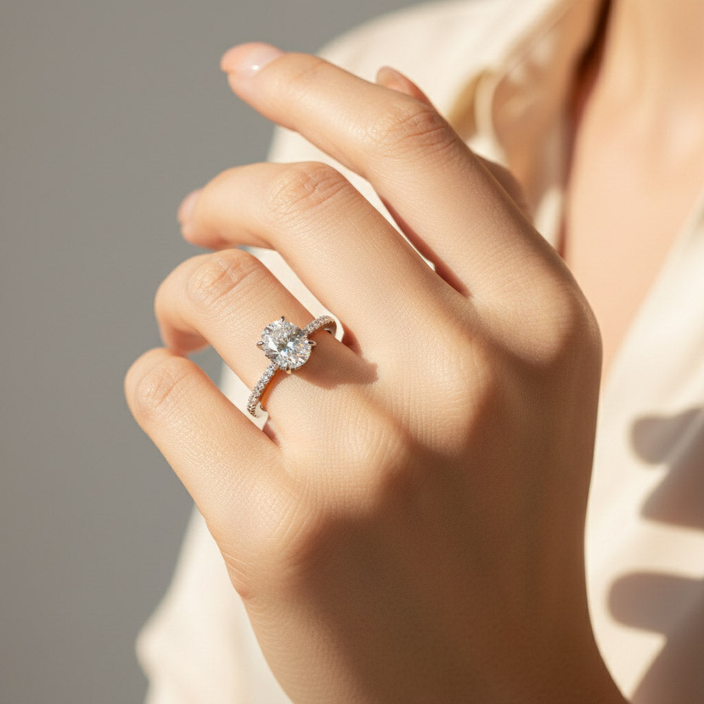 1ct Lab grown diamond oval solitaire ring on hand, platinum plated sterling silver, D/VVS1 clarity