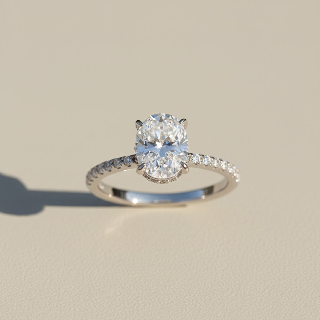 1ct Oval cut D/VVS1 lab grown diamond ring, pavé setting, platinum plated silver 