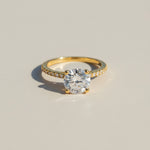 Elegant 1–2ct lab grown moissanite engagement ring in gold plated silver