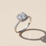 Round brilliant 1ct moissanite halo engagement ring with pavé band