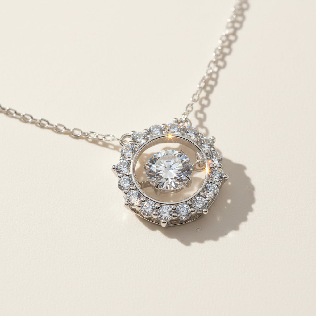 Front view of platinum-plated moissanite halo necklace