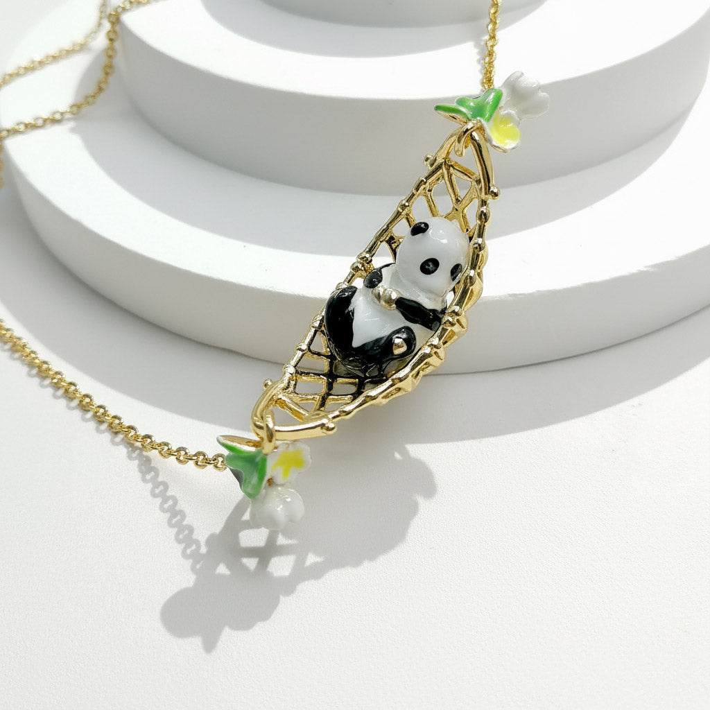 Necklace with a panda bear pendant on a white background