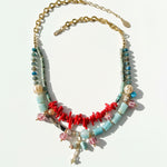 Coral and turquoise gemstone necklace with gold-plated brass chain.