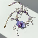 Handcrafted orchid necklace with amethyst and pearl details
