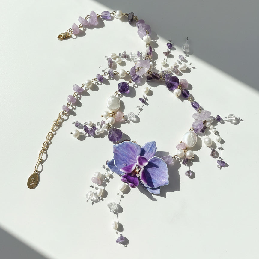 Handcrafted orchid necklace with amethyst and pearl details