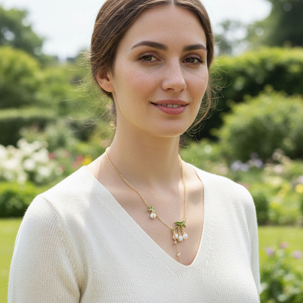 Lily of the valley gold necklace worn on model