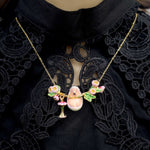 Necklace with a hedgehog pendant on a black lace background
