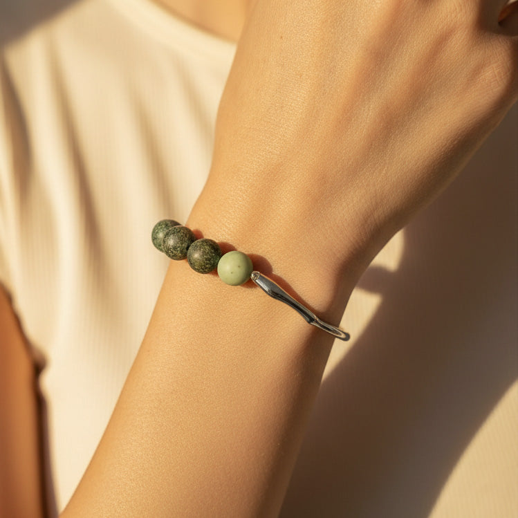 African Turquoise Jasper bracelet worn on wrist in warm golden sunlight