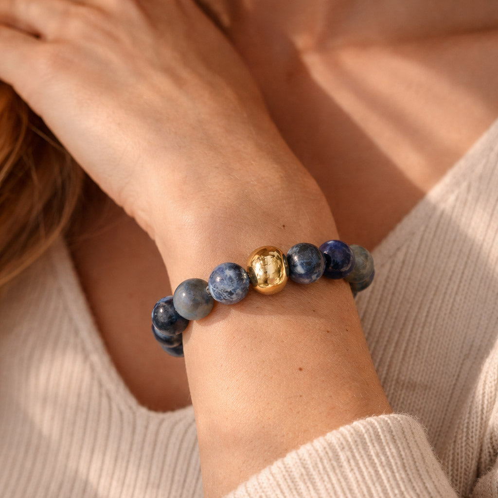 Blue Aventurine stretch bracelet worn on wrist in soft natural sunlight