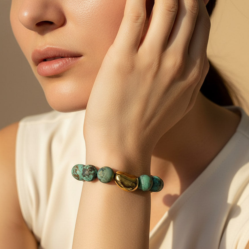 African Turquoise bracelet worn on model wrist in warm natural sunlight